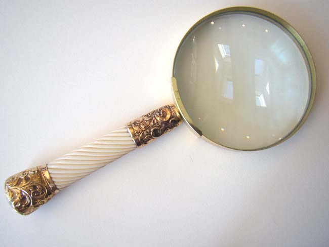 An Antique Ivory handled Magnifying Glass